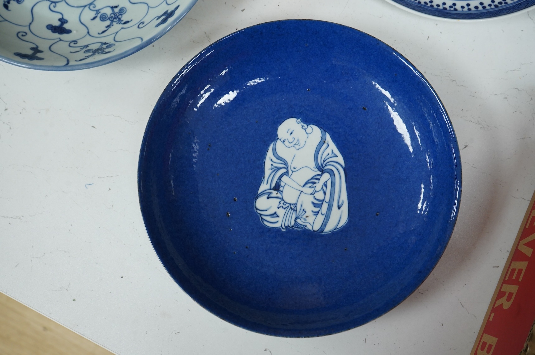 Three Chinese blue and white plates, largest 26cm